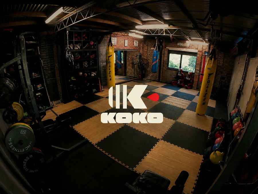 KOKO — a training gym with mats, bags, and weights